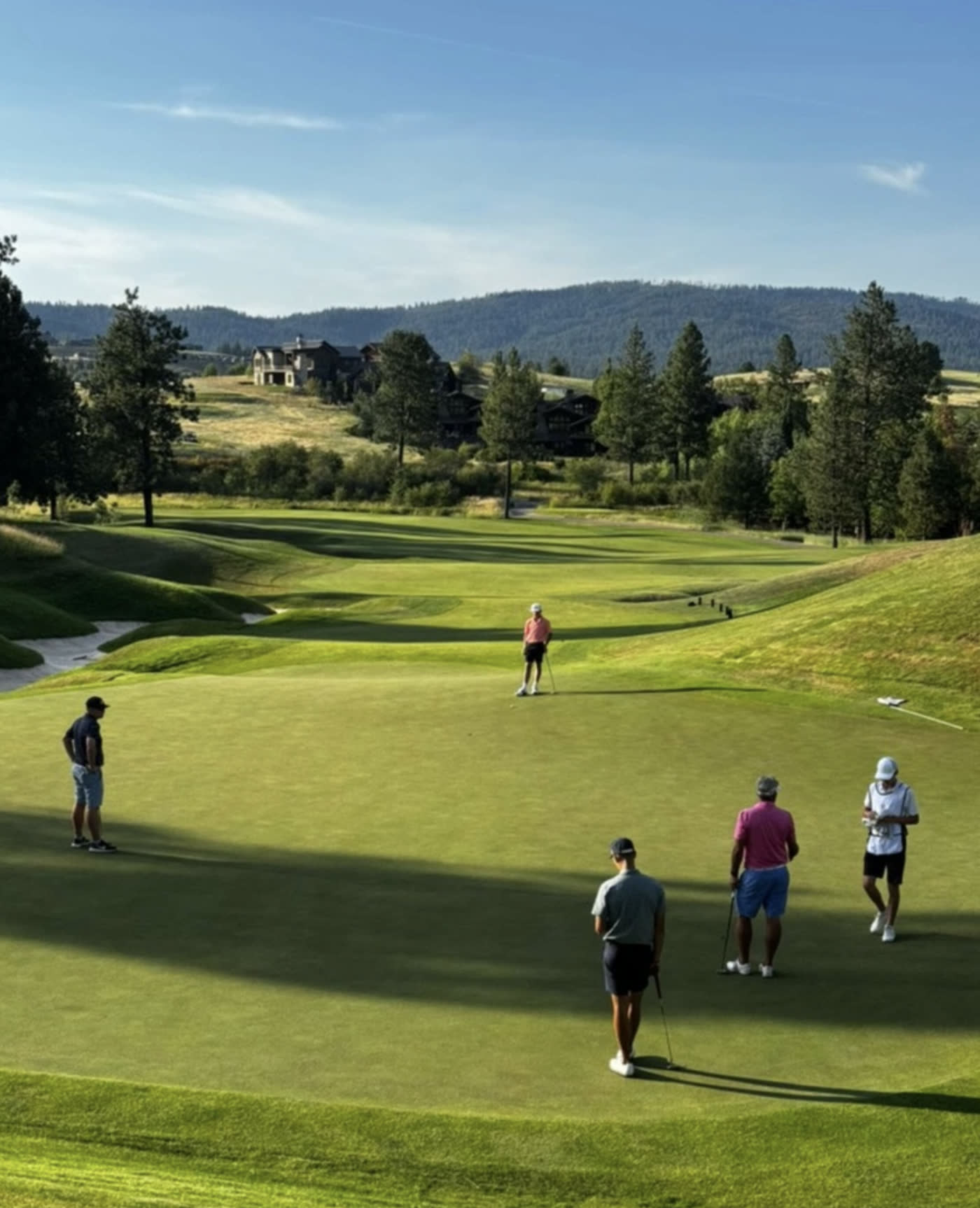 Players walking the fairway