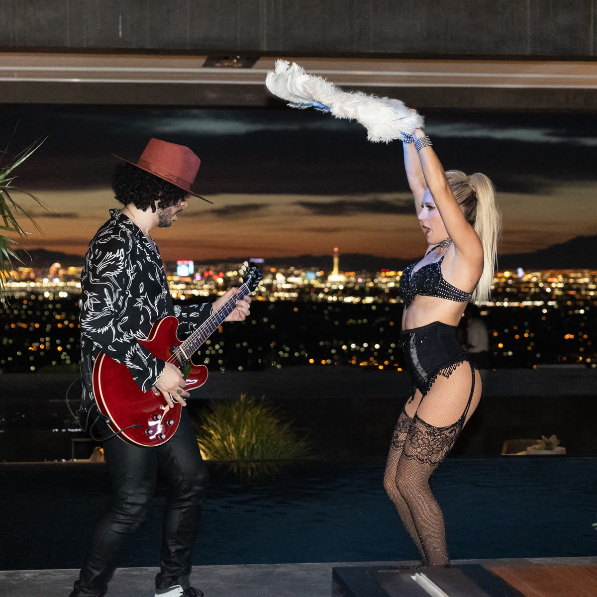 Live performer above the city lights
