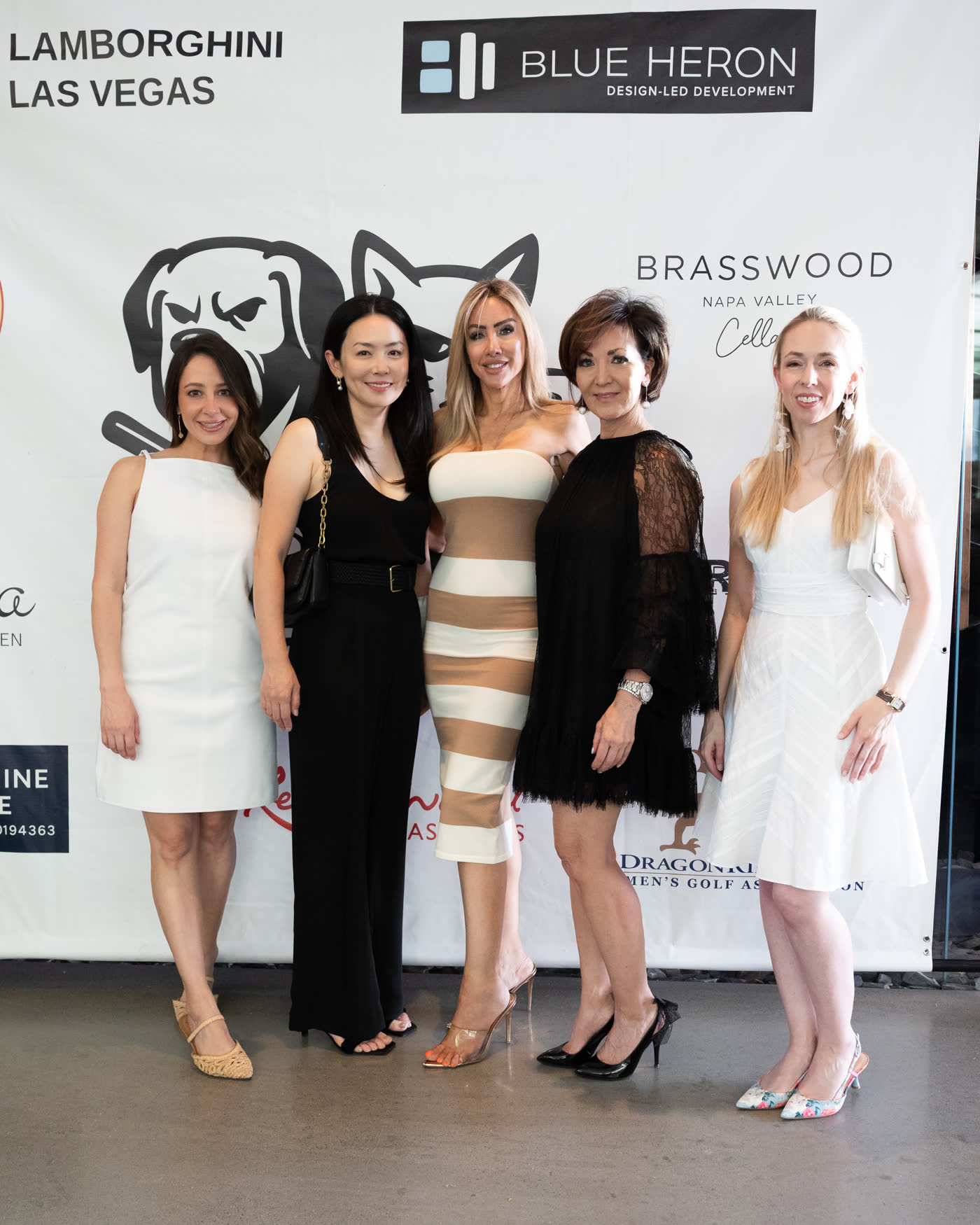 Guests at the event step-and-repeat